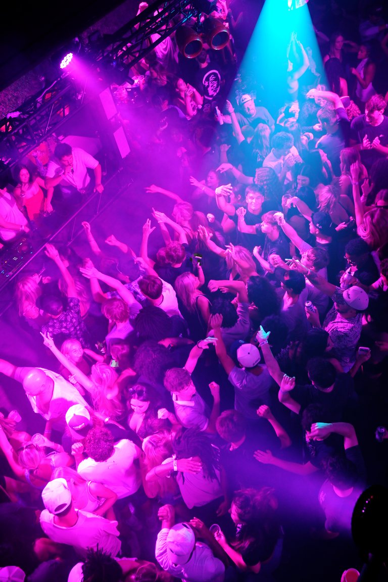 A full floor under cyan beams, seen from above